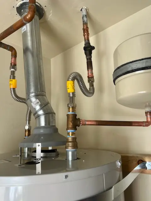 Water heater installation and plumbing repair in Upton
